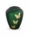 Urna funeraria de vidrio con mariposas verdes - símbolo de transformación y libertad