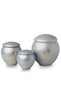 Urna mascota gris claro con patas oro