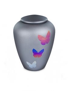 Urna funeraria de vidrio con mariposas gris grafito - símbolo de transformación y libertad