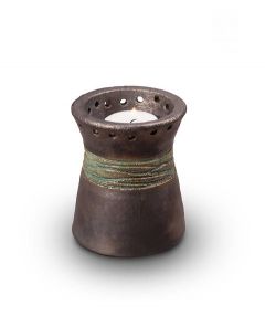 Miniurna cerámica con vela