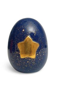 Miniurna incineración con estrella dorada