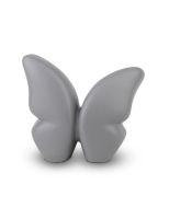 Urna mariposa pequeña de cerámica hecha a mano, gris